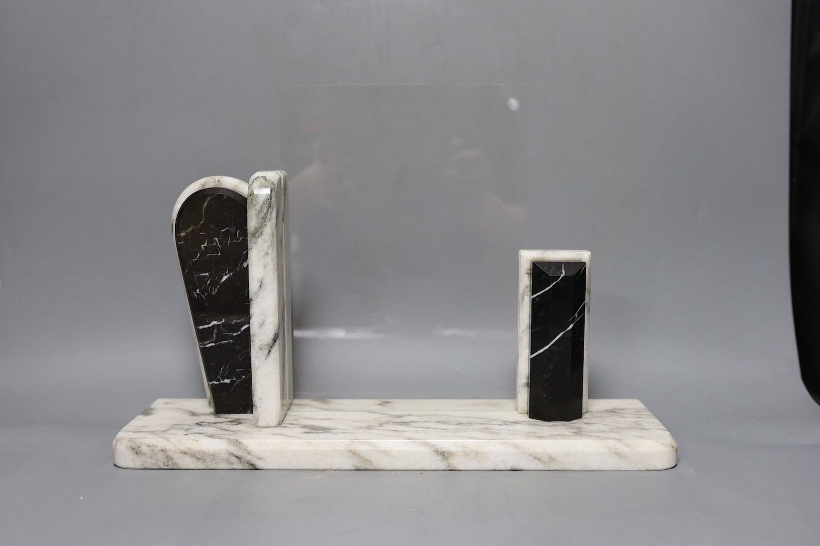 Four various Deco style marble picture frames, largest width 38cm, height 27cm